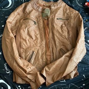 Leather jacket, pockets, zippers.